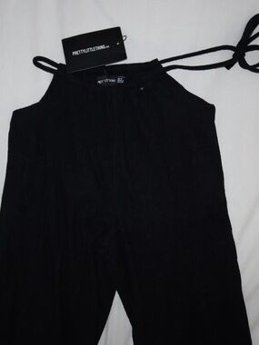 PrettyLittleThing Black Strap Halter Jumpsuit